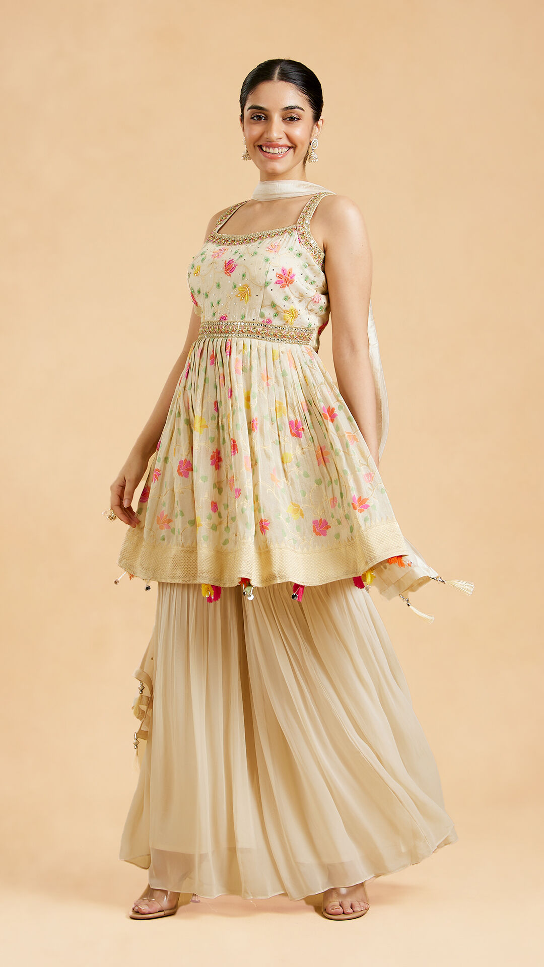 A women in white Monochromatic sharara look 